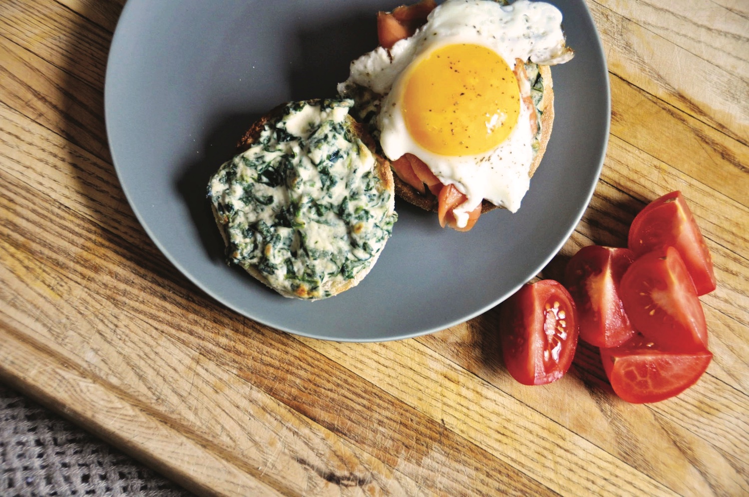 Kale and creamy spinach duo on english muffin